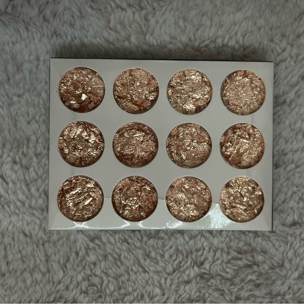 Gold foil, nail glitter and small white balls for nails
